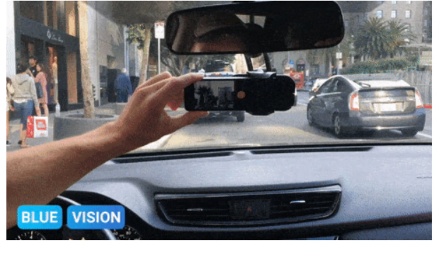 Blue Vision Labs camera phone mounted inside a vehicle for street-level mapping capture
